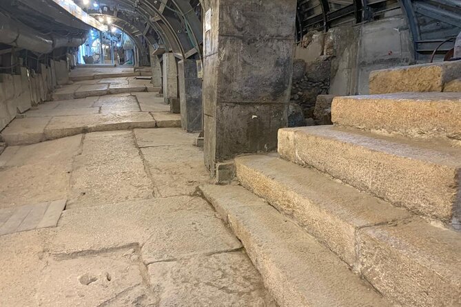 Full-Day Private and Guided Tour of the Jerusalem's Old City - A basement archaeology stop tied to Roman destruction in 70 AD