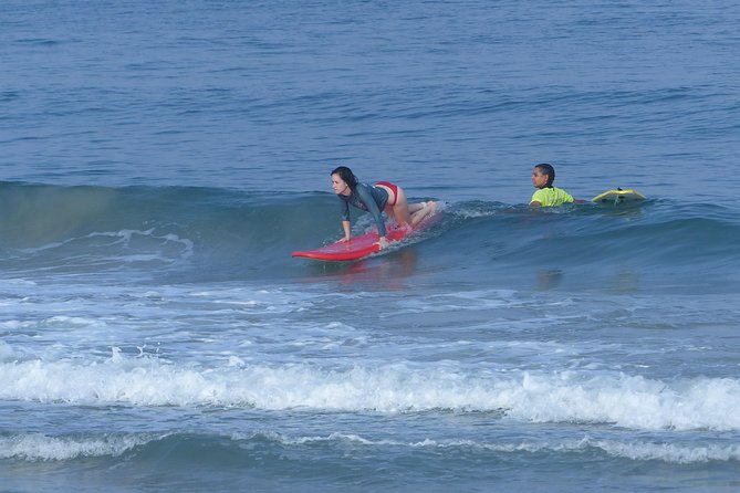 Professional Surfing lessons in the heart of Tel Aviv - Before the waves: swimsuit, towel, sunscreen, and hot coffee