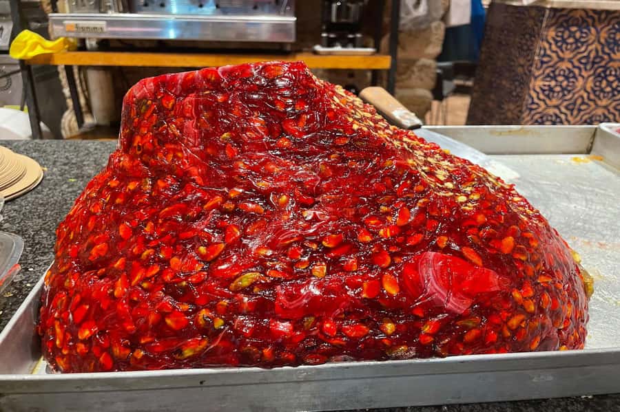 Tel Aviv: Carmel Market & Neighborhood Guided Walking Tour - Pace, group size, and how to use the free shopping time